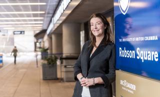 Janet Hutton poses with new Robson Square signage