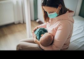 Mother breastfeeding baby