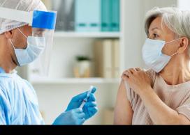 Doctor administering vaccine