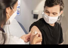 Person receiving vaccine