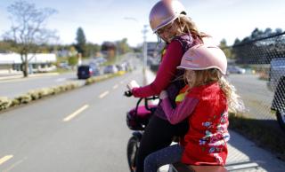 Mother and child biking